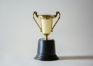 https://unsplash.com/photos/yellow-and-white-trophy-_XTY6lD8jgM