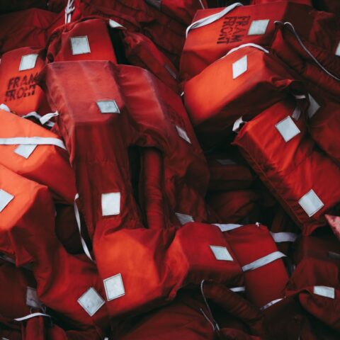 https://www.pexels.com/photo/orange-life-jackets-5291320/