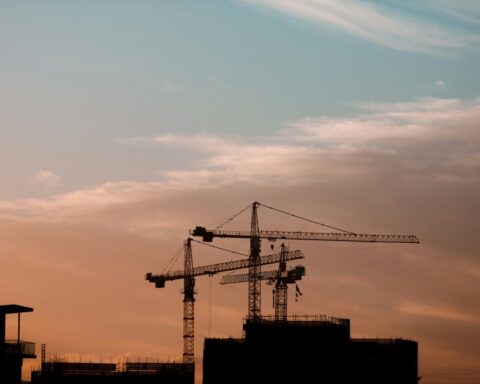https://unsplash.com/photos/three-tower-cranes-a7xke_rxZRs