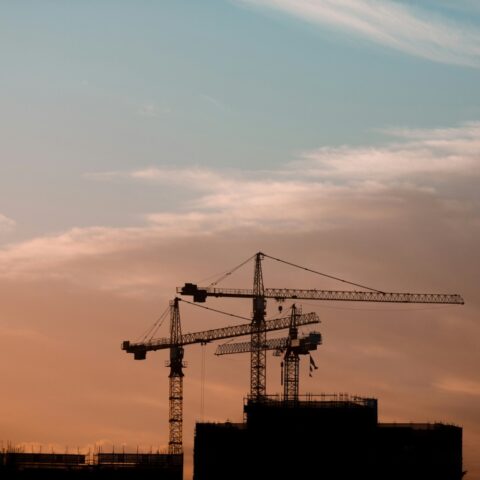 https://unsplash.com/photos/three-tower-cranes-a7xke_rxZRs